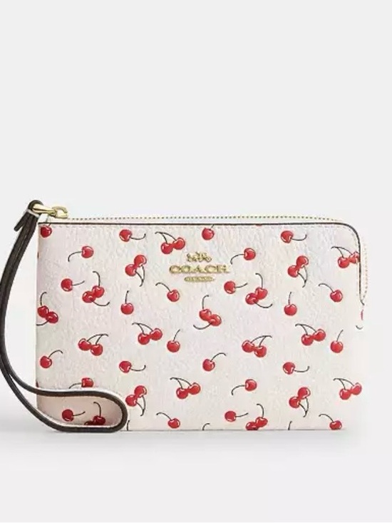 Coach Accessories - Coach White Cherry Print Wristlet with Gold Logo